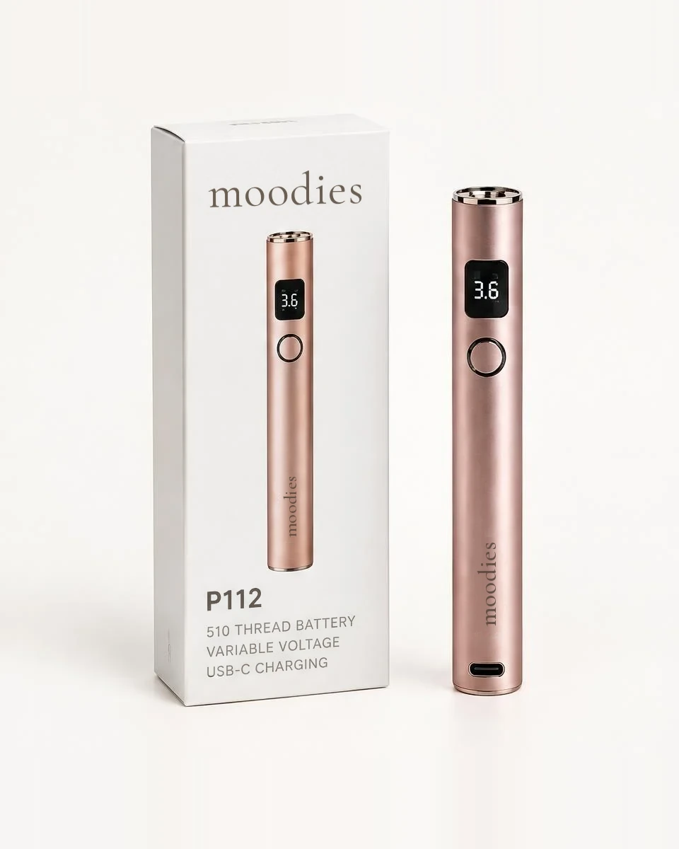 Moodies P112 510 thread smart display battery in rose gold beside its white Moodies box
